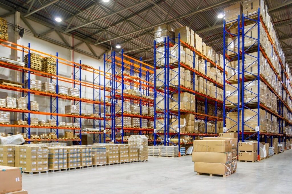 warehouse-with-pallet-racks-and-boxes-1024×682